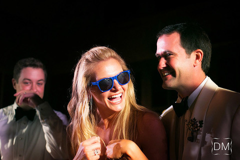 Bride laughing during Wedding reception.