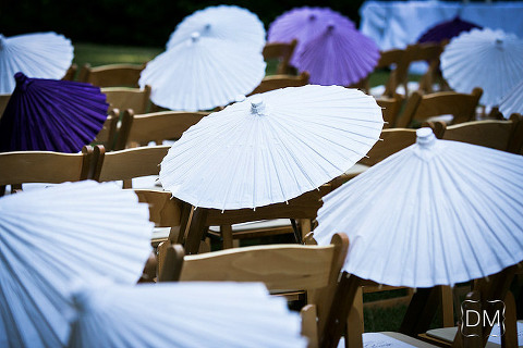 Paper umbrellas at wedding ceremony