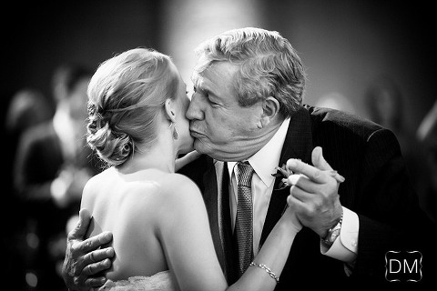Father kissing daughter at father daughter dance atlanta wedding photojournalism