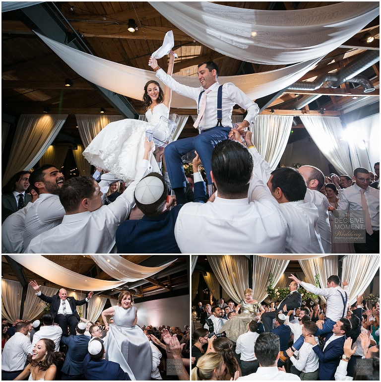 The bride and groom are lifted up for the Horah dance followed by their parents at Foundry at puritan mill wedding