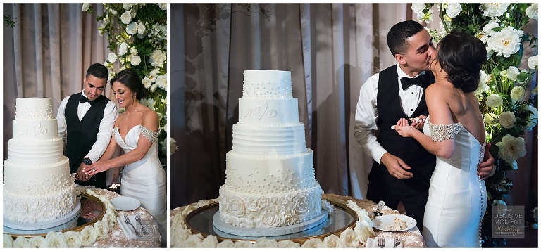 Mr. and Mrs. cut their 4-tier wedding cake by Gabriel's Bakery 